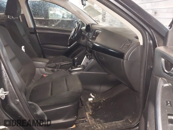 2015 Mazda CX-5 Touring with VIN JM3KE2CY2F0458114, listed as a IAAI auction lot 41545493 with 138,061 mi miles. Bid and sale history available at carsss.com. Image 5.