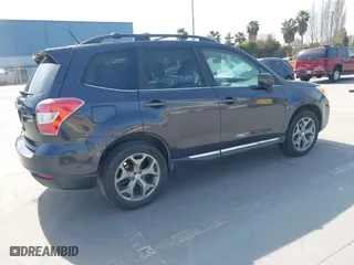 2015 Subaru Forester 2.5i Touring with VIN JF2SJAWC4FH523997, listed as a IAAI auction lot 41884674 with 175,127 mi miles. Bid and sale history available at carsss.com. Image 4.