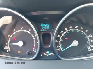 2015 Ford Fiesta SE with VIN 3FADP4BJ4FM149307, listed as a IAAI auction lot 42078091 with 124,529 mi miles. Bid and sale history available at carsss.com. Image 7.