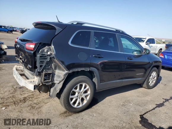 2014 Jeep Cherokee Latitude z VIN 1C4PJMCBXEW284645, wystawiony jako Copart lot #58838355 z przebiegiem 131 631 mil mil oraz Szkoda całkowita • Salvage title. Historia ofert i sprzedaży dostępna na DreamBid. Obrazek 3.