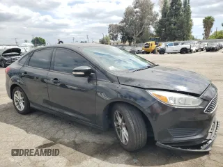 2015 Ford Focus SE with VIN 1FADP3F20FL249872, listed as a Copart auction lot 53506885 with 97,078 mi miles and Salvage title. Bid and sale history available at DreamBid. Image 4.