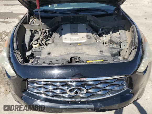 2011 Infiniti FX with VIN JN8AS1MW8BM734582, listed as a Copart auction lot 56852125 with 140,507 mi miles and Salvage title. Bid and sale history available at DreamBid. Image 12.