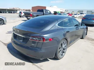 2017 Tesla Model S 100D with VIN 5YJSA1E29HF204881, listed as a IAAI auction lot 41785767 with 146,523 mi miles and . Bid and sale history available at DreamBid. Image 4.