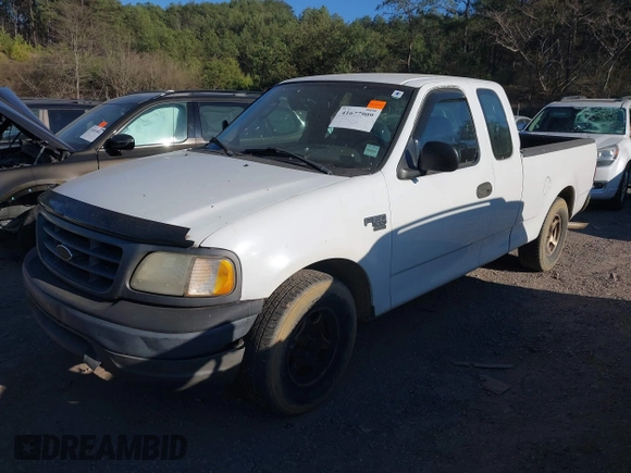 2003 Ford F-150 XL with VIN 1FTRX17W33NA66469, listed as a IAAI auction lot 41677909 with 236,619 mi miles. Bid and sale history available at carsss.com. Image 2.
