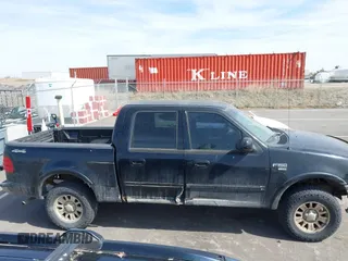 2003 Ford F-150 XLT with VIN 1FTRW08L83KA14760, listed as a IAAI auction lot 41820943 with 215,130 mi miles. Bid and sale history available at carsss.com. Image 13.