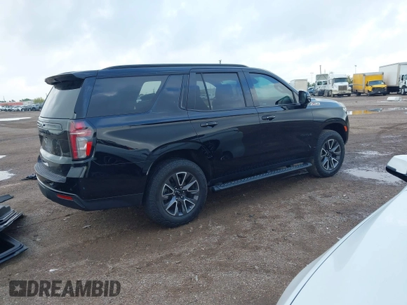 2023 Chevrolet Tahoe Z71 with VIN 1GNSKPKD9PR389603, listed as a IAAI auction lot 42082916 with 33,843 mi miles and . Bid and sale history available at DreamBid. Image 4.