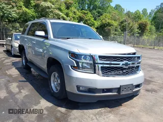 2015 Chevrolet Tahoe LT z VIN 1GNSCBKC3FR741192, wystawiony jako IAAI lot #42113232 z przebiegiem 156 741 mil mil oraz . Historia ofert i sprzedaży dostępna na DreamBid. Obrazek 1.