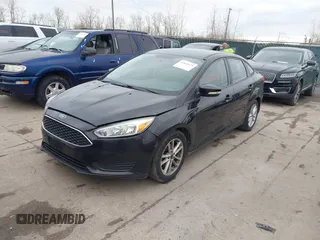2015 Ford Focus SE with VIN 1FADP3F21FL355666, listed as a IAAI auction lot 41828579 with 110,002 mi miles. Bid and sale history available at carsss.com. Image 2.