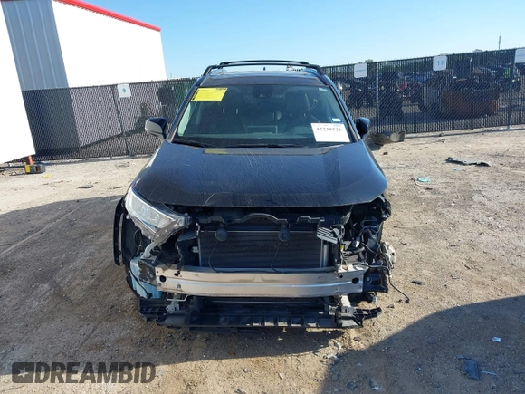 2021 Toyota RAV4 XLE Premium z VIN 2T3C1RFVXMW105387, wystawiony jako IAAI lot #42238526 z przebiegiem 58 627 mil mil oraz . Historia ofert i sprzedaży dostępna na DreamBid. Obrazek 6.