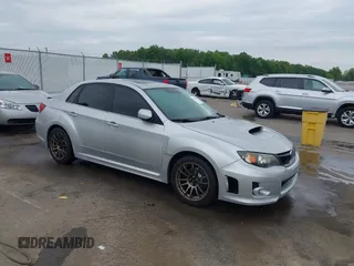 2011 Subaru WRX WRX Premium z VIN JF1GV7F69BG505099, wystawiony jako IAAI lot #42192114 z przebiegiem 129 299 mil mil oraz . Historia ofert i sprzedaży dostępna na DreamBid. Obrazek 1.