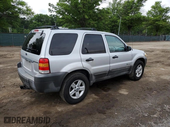 2005 Ford Escape Hybrid with VIN 1FMCU96H55KC74059, listed as a Copart auction lot 57065685 with 154,807 mi miles and Salvage title. Bid and sale history available at DreamBid. Image 3.