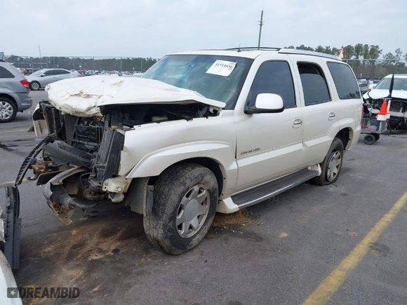 2002 Cadillac Escalade with VIN 1GYEK63N62R157941, listed as a IAAI auction lot 41514656 with 273,731 mi miles. Bid and sale history available at carsss.com. Image 2.