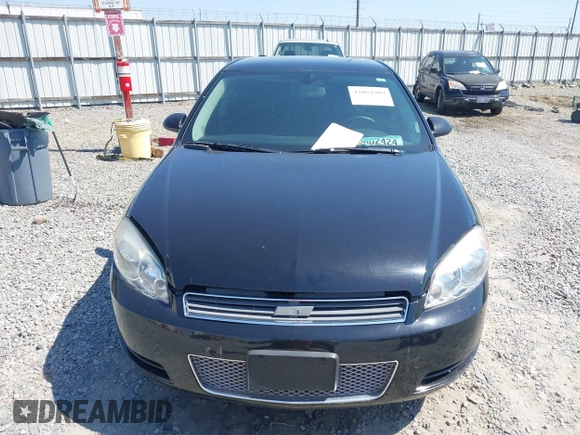 2012 Chevrolet Impala LS Retail with VIN 2G1WA5E38C1306100, listed as a IAAI auction lot 42052909 with 248,528 mi miles and . Bid and sale history available at DreamBid. Image 12.