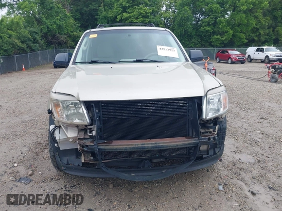 2010 Mercury Mariner with VIN 4M2CN8B73AKJ05123, listed as a IAAI auction lot 42512923 with 240,736 mi miles and . Bid and sale history available at DreamBid. Image 13.