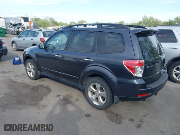 2009 Subaru Forester with VIN JF2SH65629H705318, listed as a IAAI auction lot 42120698 with 194,582 mi miles and . Bid and sale history available at DreamBid. Image 3.