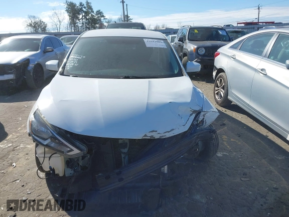 2019 Nissan Sentra S z VIN 3N1AB7AP4KY265082, wystawiony jako IAAI lot #41642989 z przebiegiem 75 937 mil mil oraz . Historia ofert i sprzedaży dostępna na DreamBid. Obrazek 12.