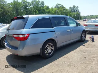 2011 Honda Odyssey EX-L with VIN 5FNRL5H60BB051135, listed as a IAAI auction lot 42588994 with 195,112 mi miles and . Bid and sale history available at DreamBid. Image 4.