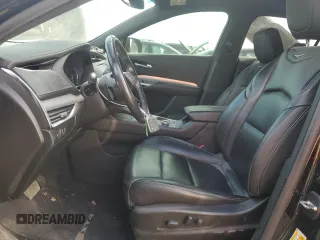 2019 Cadillac XT4 AWD Premium Luxury with VIN 1GYFZDR4XKF170289, listed as a Copart auction lot 52112025 with 100,524 mi miles and Salvage Title. Bid and sale history available at carsss.com. Image 7.