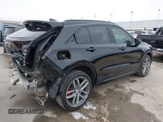 2021 Cadillac XT4 FWD Sport with VIN 1GYFZER40MF039140, listed as a IAAI auction lot 41287513 with 51,725 mi miles and . Bid and sale history available at DreamBid. Image 4.