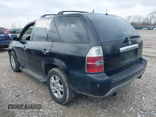 2005 Acura MDX Touring with VIN 2HNYD18945H514351, listed as a IAAI auction lot 41688097 with 323,000 mi miles. Bid and sale history available at carsss.com. Image 3.