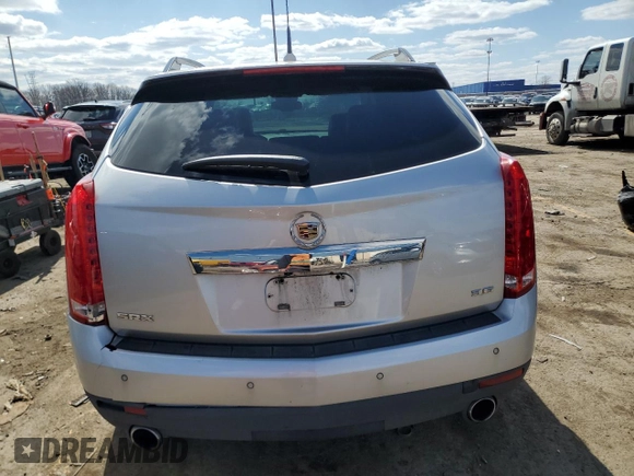 2012 Cadillac SRX Luxury Collection z VIN 3GYFNAE39CS502422, wystawiony jako Copart lot #52488405 z przebiegiem 109 001 mil mil oraz Czysty tytuł • Clean title. Historia ofert i sprzedaży dostępna na DreamBid. Obrazek 6.