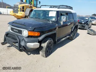 2007 Toyota FJ Cruiser with VIN JTEBU11F370035644, listed as a IAAI auction lot 41698247 with 214,482 mi miles. Bid and sale history available at carsss.com. Image 2.