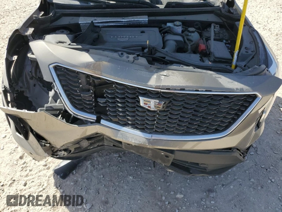2020 Cadillac XT4 FWD Sport z VIN 1GYFZER40LF134537, wystawiony jako Copart lot #48219045 z przebiegiem 77 307 mil mil oraz Szkoda całkowita • Salvage title. Historia ofert i sprzedaży dostępna na DreamBid. Obrazek 13.