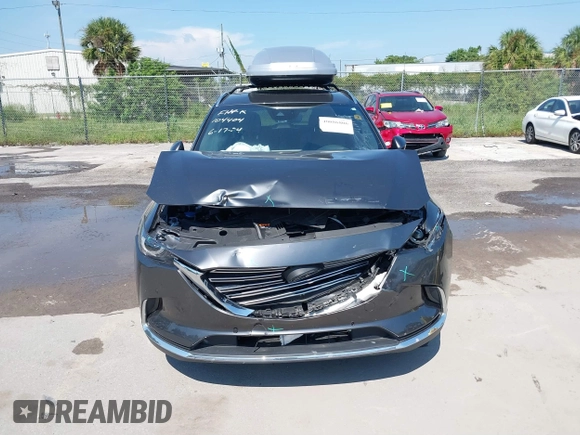2022 Mazda CX-9 Grand Touring with VIN JM3TCBDY4N0618680, listed as a IAAI auction lot 40086806 with 34,142 mi miles and . Bid and sale history available at DreamBid. Image 12.