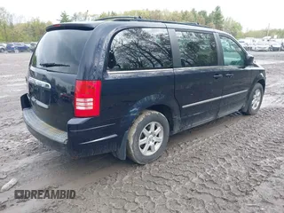 2010 Chrysler Town & Country Touring with VIN 2A4RR5D15AR170014, listed as a IAAI auction lot 42202810 with 199,557 mi miles and . Bid and sale history available at DreamBid. Image 4.