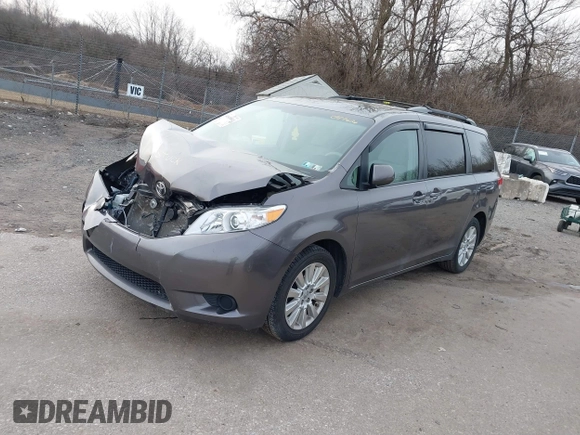 2014 Toyota Sienna LE with VIN 5TDJK3DC1ES087626, listed as a IAAI auction lot 41610813 with 142,311 mi miles and . Bid and sale history available at DreamBid. Image 2.