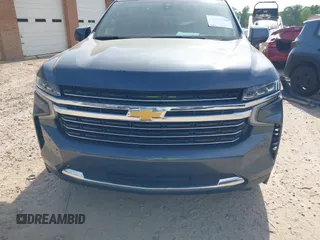 2021 Chevrolet Tahoe LT z VIN 1GNSKNKD4MR250981, wystawiony jako IAAI lot #42092550 z przebiegiem 89 414 mil mil oraz . Historia ofert i sprzedaży dostępna na DreamBid. Obrazek 12.