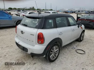 2013 MINI Countryman with VIN WMWZB3C5XDWM31620, listed as a Copart auction lot 51096035 with 93,928 mi miles and Salvage title. Bid and sale history available at DreamBid. Image 3.