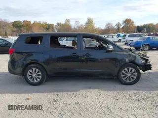 2021 Kia Sedona LX with VIN KNDMB5C1XM6673667, listed as a IAAI auction lot 40759077 with Not Provided miles and . Bid and sale history available at carsss.com. Image 12.