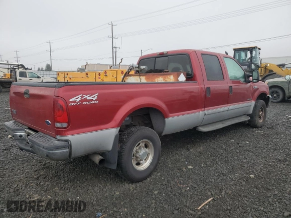 2002 Ford F-350 XL with VIN 1FTSW31FX2EC73836, listed as a Copart auction lot 82403774 with 188,898 mi miles and Salvage title. Bid and sale history available at DreamBid. Image 4.