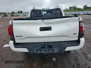 2021 Toyota Tacoma SR with VIN 3TMCZ5AN7MM450757, listed as a Copart auction lot 59021405 with Not provided miles and Salvage title. Bid and sale history available at DreamBid. Image 6.