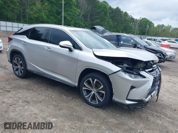 2016 Lexus RX 350 z VIN 2T2ZZMCA5GC002315, wystawiony jako IAAI lot #42107312 z przebiegiem 156 339 mil mil oraz . Historia ofert i sprzedaży dostępna na DreamBid. Obrazek 1.