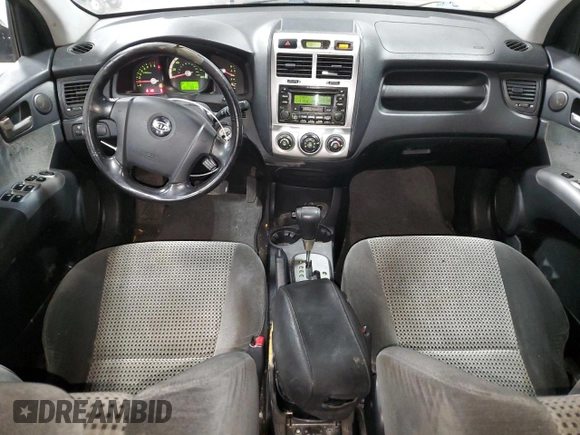 2005 Kia Sportage LX with VIN KNDJF723557033271, listed as a Copart auction lot 84699134 with 182,798 mi miles and Non Repairable. Bid and sale history available at carsss.com. Image 8.