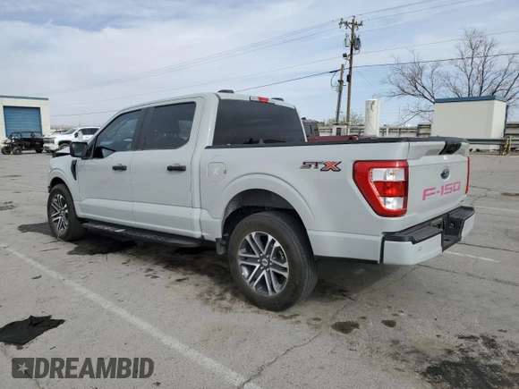 2023 Ford F-150 XL with VIN 1FTEW1CP4PKF86851, listed as a Copart auction lot 50611185 with 15,773 mi miles and Salvage Title. Bid and sale history available at DreamBid. Image 2.