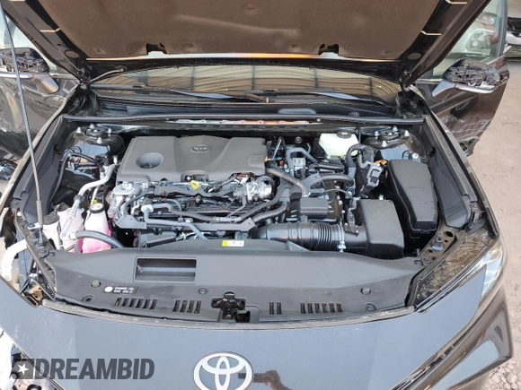 2025 Toyota Camry LE z VIN 4T1DAACK5SU592617, wystawiony jako Copart lot #56370875 z przebiegiem 1 615 mil mil oraz Szkoda całkowita • Salvage title. Historia ofert i sprzedaży dostępna na DreamBid. Obrazek 11.