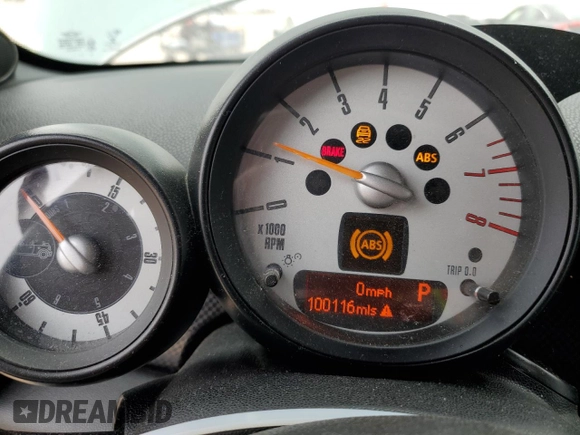 2014 MINI Convertible S with VIN WMWZP3C56ET707425, listed as a Copart auction lot 50894965 with 100,116 mi miles and Salvage Title. Bid and sale history available at DreamBid. Image 9.
