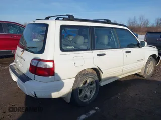 2002 Subaru Forester S w/Premium Pkg with VIN JF1SF65662H739973, listed as a IAAI auction lot 41731564 with 122,452 mi miles. Bid and sale history available at carsss.com. Image 4.