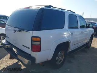 2005 Chevrolet Tahoe LT with VIN 1GNEC13T25R139386, listed as a IAAI auction lot 41670371 with 309,414 mi miles. Bid and sale history available at carsss.com. Image 4.
