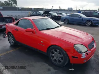 1999 Mercedes-Benz SLK-Class with VIN WDBKK47F2XF107044, listed as a IAAI auction lot 41467413 with 80,888 mi miles. Bid and sale history available at carsss.com. Image 1.