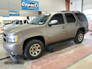 2012 Chevrolet Tahoe LS with VIN 1GNSKAE0XCR110563, listed as a Copart auction lot 54203235 with 136,040 mi miles and Salvage title. Bid and sale history available at DreamBid. Image 1.