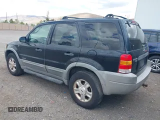 2001 Ford Escape XLT with VIN 1FMCU041X1KA93910, listed as a IAAI auction lot 42270271 with 151,166 mi miles and . Bid and sale history available at DreamBid. Image 3.