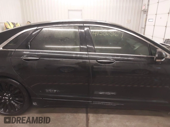 2015 Lincoln MKZ z VIN 3LN6L2J95FR620390, wystawiony jako IAAI lot #41586267 z przebiegiem 127 870 mil mil oraz . Historia ofert i sprzedaży dostępna na DreamBid. Obrazek 13.