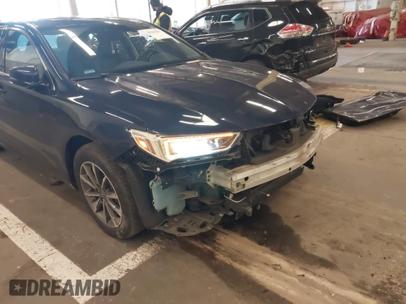 2020 Acura TLX w/Technology Pkg with VIN 19UUB1F58LA001692, listed as a IAAI auction lot 41562503 with 70,664 mi miles. Bid and sale history available at carsss.com. Image 19.