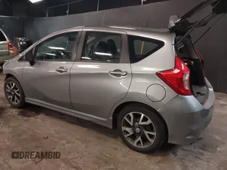 2015 Nissan Note SV with VIN 3N1CE2CP0FL400447, listed as a IAAI auction lot 41669498 with 96,699 mi miles and . Bid and sale history available at DreamBid. Image 3.