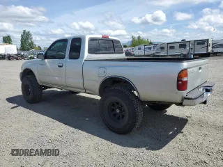 2000 Toyota Tacoma with VIN 5TEWN72N8YZ717707, listed as a Copart auction lot 54479455 with 197,407 mi miles and Salvage title. Bid and sale history available at DreamBid. Image 2.