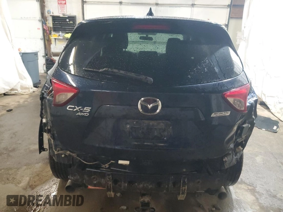 2016 Mazda CX-5 Touring z VIN JM3KE4CY4G0838908, wystawiony jako Copart lot #57961625 z przebiegiem 178 615 mil mil oraz Szkoda całkowita • Salvage title. Historia ofert i sprzedaży dostępna na DreamBid. Obrazek 6.